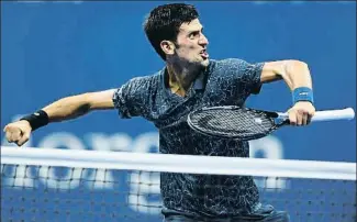  ?? DON EMMERT / AFP ?? Djokovic superó en tres sets a Millman en los cuartos de final