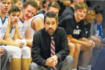  ?? STAFF PHOTO BY ERIN O. SMITH ?? Boyd Buchanan boys’ basketball coach Josh Templeton watches Tuesday’s game against Chattanoog­a Christian. The Buccaneers have won 18 games this season, their first with Templeton as head coach, after a combined 15 victories the past two seasons.