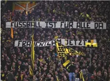  ??  ?? Support...Dortmund fans demand a women’s team