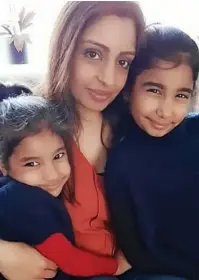  ??  ?? Pregnant: Reeta Saidha with her daughters