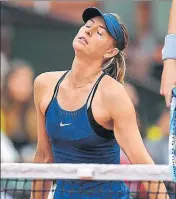  ?? AFP ?? Maria Sharapova reacts during her quarterfin­al match against Garbine Muguruza in Paris on Wednesday.