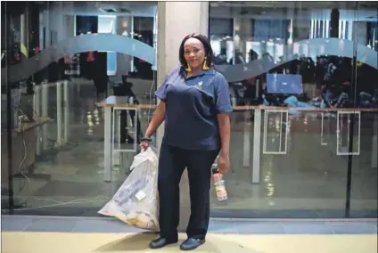  ??  ?? Battle: The best birthday gift for Deliwe Mzobe, a cleaner at Wits University, was the end to outsourcin­g