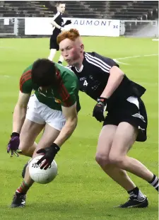  ??  ?? Evan Lyons defends for Sligo. Below: