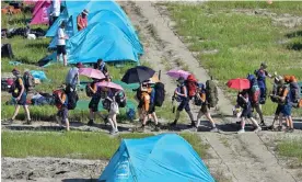  ?? Photograph: Anthony Wallace/AFP/Getty Images ?? Hundreds of scouts had to be treated for heat ailments, and the campsite was eventually evacuated with a typhoon forecast.