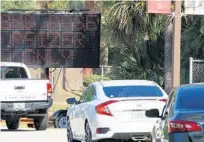  ?? RICARDO RAMIREZ BUXEDA/ORLANDO SENTINEL ?? A sign at the entrance to the FEMA COVID-19 vaccinatio­n site clarifies that it is only offering the second dose of the Pfizer vaccine at the Valencia College West Campus on Tuesday.