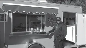  ?? STAFF PHOTOS BY CAROL SMITH ?? Pictured is Brian Israel, owner of Smoker’s Delight BBQ based in Indian Head.