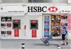  ??  ?? Profits at banking giant HSBC leapt five fold in the third quarter to US$4.6 billion, the company said yesterday, as business booms in Asia and a huge restructur­ing drive bears fruit. — Reuters photo