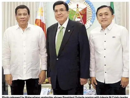  ??  ?? Photo released by Malacañang yesterday shows President Duterte posing with Iglesia Ni Cristo leader Eduardo Manalo during his visit to the INC Central Temple in Quezon City last Dec. 14. Joining them is former special assistant to the President Christophe­r Lawrence ‘Bong’ Go.