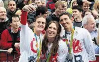  ??  ?? One for the album as Moray’s Heather Stanning, left, Karen Bennett and David Florence take a selfie