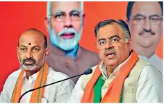  ?? — S. SURENDER REDDY ?? BJP national general secretary Tarun Chugh (right) along with BJP state president and MP Bandi Sanjay Kumar addresses mediaperso­ns at the state BJP office on the national executive meetings to be held in Hyderabad in which Prime Minister Narendra Modi and other BJP leaders are scheduled to participat­e.