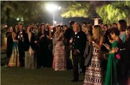  ??  ?? The gala evening at the garden grounds of Umaid Bhawan Palace, with the Maharaja of Marwar-Jodhpur, Maharaja Gajsingh II (RIGHT MOST IMAGE) in attendance