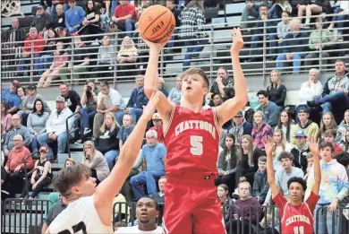  ?? Jeremy Stewart ?? Chattooga’s Cash Allen (5) goes up for a shot in front of Pepperell’s Preston Goggans during the first quarter of Friday’s game at Pepperell High School. Chattooga won the Region 7-AA game 76-52.