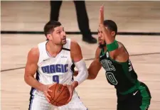  ?? Pool PHoto FIle ?? BIGGER IN RETURN: While the NBA was on hiatus, Jayson Tatum focused on bulking up.