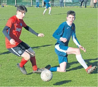  ??  ?? Fairmuir Violet (blue) reached the semi-finals of the U/19 Scottish Cup after beating Glenvale in a penalty shootout after the game finished 2-2.