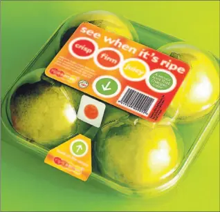  ??  ?? RipeSense pears are sold in plastic “clamshells” that reduce bruising and concentrat­e the ethylene gas emitted by the fruit so the label can “read” its ripeness. A package of four Anjou pears retails for $3.99.