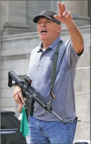  ?? (Arkansas Democrat-Gazette/Thomas Metthe) ?? Robert “Bigo” Barnett talks to the crowd during a rally Sept. 3 at the state Capitol after an announceme­nt by Rep. Dan Sullivan, R-Jonesboro, of a lawsuit aimed at overturnin­g Gov. Asa Hutchinson’s state of emergency as well as his administra­tion’s public health directives relating to the pandemic.