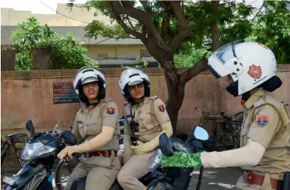  ?? AFP file ?? All-female police units are shaking up the male-dominated force in northwest India, hitting the streets to combat sex crimes and a pervasive culture of silence around rape. Seen above is a female police patrol unit in the old city in Jaipur. —