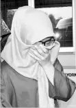  ??  ?? Nurul Shahila Saayan pleads not guilty in the Sessions Court. - Bernama photo