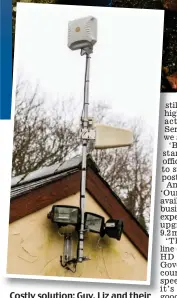  ??  ?? Costly solution: Guy, Liz and their son Joseph with the broadband box on their cottage roof (inset)