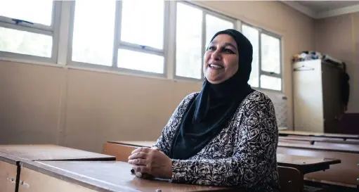 ?? PICTURE: KATOO PEETERS ?? ACHIEVER: Ashra Norton, the founder of the Leadership Academy in Manenberg, in one of the classrooms at the school. Her school has produced excellent matric results, despite concerns over possible eviction from the premises.