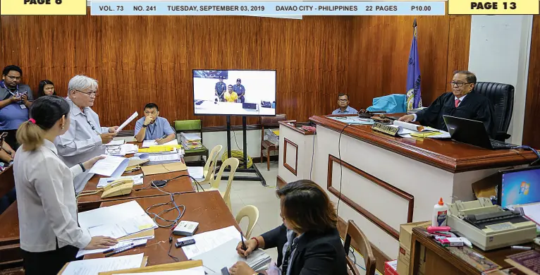  ??  ?? LEONILO Gonzales (in yellow shirt, on TV screen), a high-risk inmate of the Davao City Jail, appears in court via video teleconfer­encing for the arraignmen­t of his attempted murder case before Judge Emmanuel Castro of the Davao City Regional Trial Court Branch 16 on September 2, 2019. Mindanews Photo by Manman Dejeto