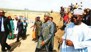  ??  ?? The Minister of Transporta­tion, Mr Rotimi Amaechi (2nd right) and Kogi State Governor, Alhaji Yahaya Bello (right) at the flag- off of the maintenanc­e dredging of Ajaokuta-Onitsha water channel in Ajaokuta, Kogi State yesterday