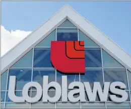  ?? CP PHOTO/RYAN REMIORZ ?? A Loblaws store is seen March 9, 2015, in Montreal. Loblaw Companies Ltd. says minimum wage increases in Ontario and Alberta and health care reform in Quebec are expected to hurt its bottom line.