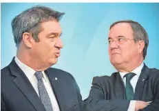  ?? FOTO: DPA ?? Markus Söder (l.) und Armin Laschet buhlen um die Kanzlerkan­didatur.