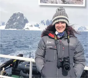  ??  ?? Pole star Dr Kirsty Robb is now home after her Antarctic experience. Inset, Kirsty saw three different species of penguin on her trip