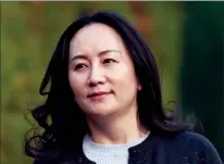  ?? CP PHOTO JONATHAN HAYWARD ?? Chief Financial Officer of Huawei, Meng Wanzhou leaves her home in Vancouver on Monday.