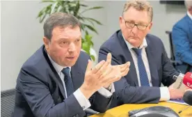  ?? Photo / Mark Mitchell ?? Rob Everett (left) and Adrian Orr yesterday released a joint report on the conduct and culture of 11 banks operating in New Zealand.