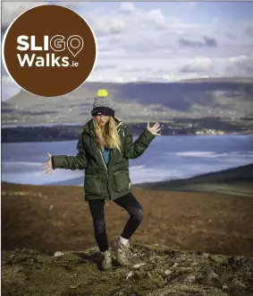  ??  ?? Winner of recent Call of the Wild photo competitio­n - Maggie Dorey standing on Knocknarea, photo taken by her father Martin