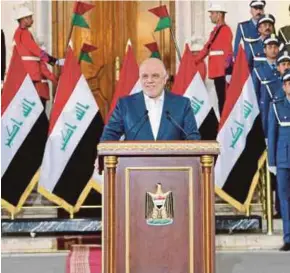  ?? AFP PIC ?? Prime Minister Haider al-Abadi delivering a televised speech in Baghdad on Saturday, announcing the end of a three-year war by Iraqi forces to drive the Islamic State out of the country.