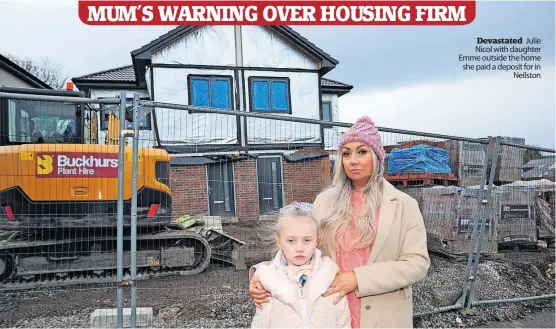  ?? ?? Devastated Julie Nicol with daughter Emme outside the home she paid a deposit for in Neilston