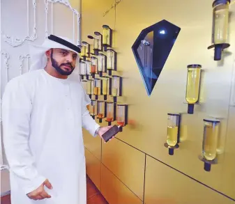  ?? Ahmed Kutty/Gulf News ?? Saleh Al Hammadi at his shop Perfume Bay at Marina Mall in Abu Dhabi. In the fragrance business for 15 years, he is keen to see Arabic perfumes recognised internatio­nally.