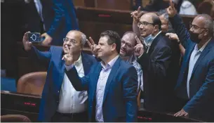  ?? (Yonatan Sindel/Flash90) ?? JOINT LIST MKS take a selfie in the Knesset earlier this week after the citizenshi­p law failed to pass.