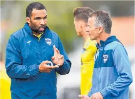  ?? Photosport.nz ?? Paul Ifill (left) is coaching and playing for Tasman United.