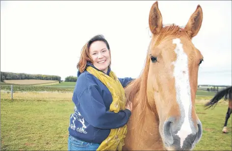  ?? GUARDIAN FILE PHOTO ?? Ellen Jones, owner/operator of Hughes-Jones Centre for People and Animals, wants answers from the provincial government as to why it rejected her plan to subdivide a Meadow Bank property to accommodat­e her horse therapy operation.