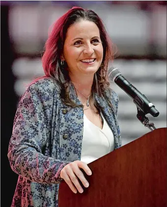  ?? SARAH GORDON/THE DAY ?? Jennifer Rizzotti is all smiles while speaking during her introducto­ry press conference welcoming her as team president of the WNBA’s Connecticu­t Sun on Tuesday at Mohegan Sun Arena.