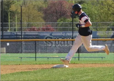  ?? ED MORLOCK/MEDIANEWS GROUP ?? Joe Jaconski touches second base after hitting a two-run home run.