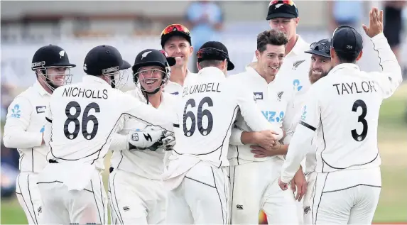  ?? Picture: Phil Walter/Getty ?? New Zealand players celebrate after Mitchell Santner’s dismissal of Pakistan batsman Mohammad Abbas in the first Test