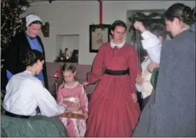  ?? SUBMITTED PHOTO ?? Visitors can visit the Ironmaster’s Family in the mansion and learn about Victorian parlor games at the Christmas at Joanna event.