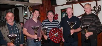  ??  ?? Senior winners St Leonard’s: Michael Walsh, James Stafford, Francis Stafford, Michael Murphy and John Mackey with their trophies.