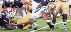  ?? CHRIS CODUTO/AP ?? UCLA running back Zach Charbonnet hasn’t scored a rushing touchdown since Sept. 25. Finding the end zone will be key for the Bruins to win.