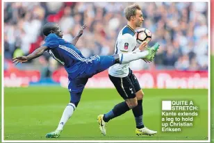  ??  ?? QUITE A STRETCH: Kante extends a leg to hold up Christian Eriksen