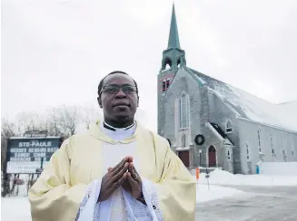  ?? THE CANADIAN PRESS ?? Father Gauthier Elleme, at Ste-Paule in Saint-Jérôme, Que., co-ordinates activities in four parishes. He believes the threat of closures served as a wake-up call and he’s seeing a growing core of young members stepping into church life.