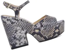  ??  ?? Shayla: Snakeskin leather print adds a touch of fall-winter luxury to this ‘90s shoe shape.