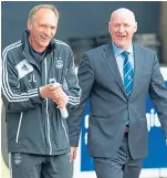  ??  ?? Aberdeen goalkeepin­g coach Jim Leighton sharing a joke with Dundee boss John Brown in 2013.