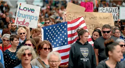  ?? PHOTO: CAMERON BURNELL/FAIRFAX NZ ?? Hundreds of people marched in Wellington on Saturday to protest the inaugurati­on of United States President Donald Trump.