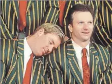  ?? GETTY ?? Shane Warne takes a snooze on Steve Waugh’s shoulder before the official World Cup snap. The photograph was taken days after the Windies tour of 1999.